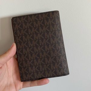 Michael Kora Wallet
